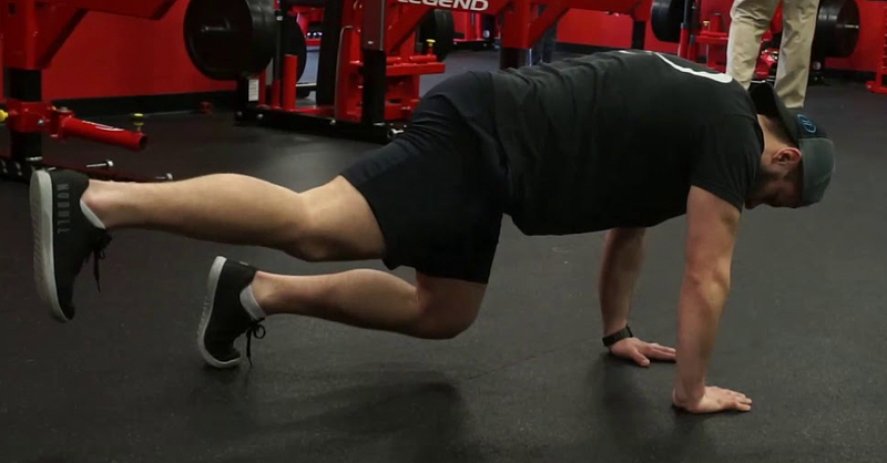 Bear plank kickbacks for knee stability