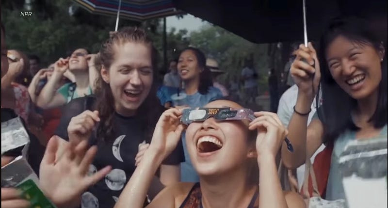 People gathering to observe the solar eclipse