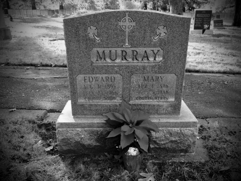 A headstone honoring departed loved ones