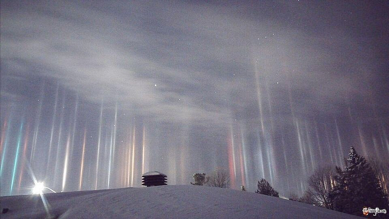 Light pillars created by terrestrial light sources