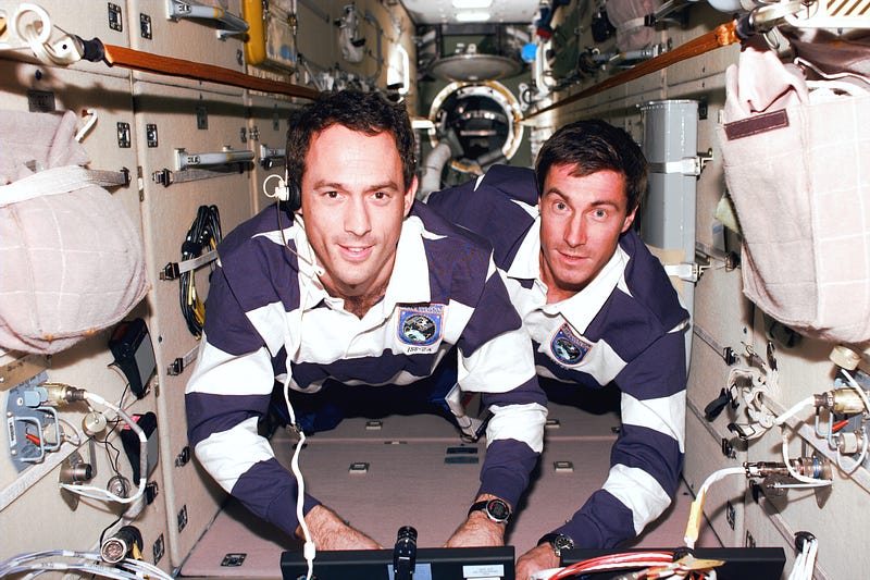 Krikalev aboard the ISS with astronaut James H Newman